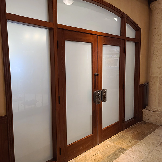 Advanced Window Tinting installed a frosted privacy film on the glass doors for the Ponte Verde Inn.