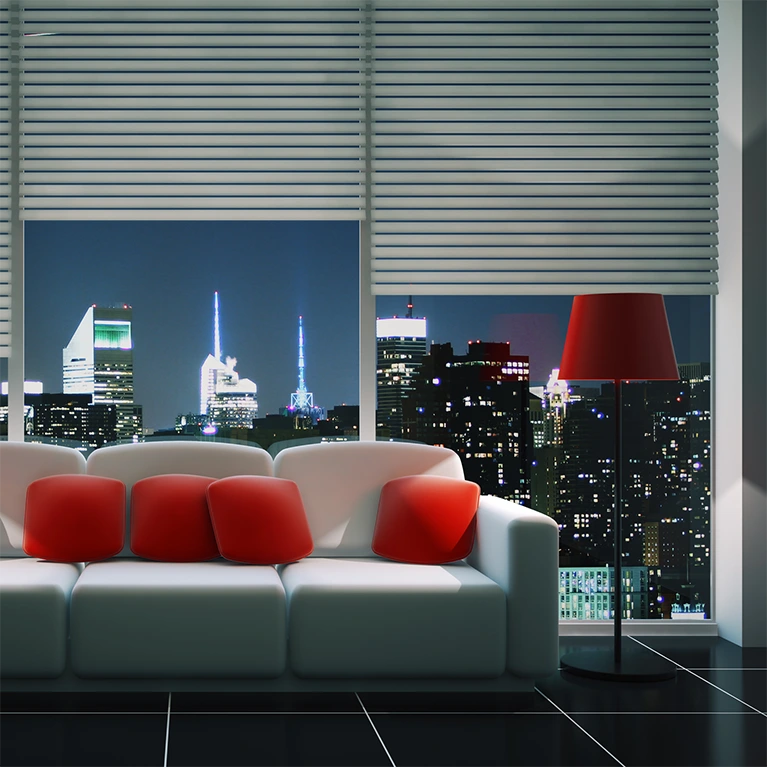 At night, 3M Night Vision window film prevents the reflection on the inside of the glass offering beautiful, unhindered night views such as this view of a city skyline.
