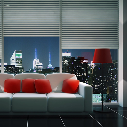 At night, 3M Night Vision window film prevents the reflection on the inside of the glass offering beautiful, unhindered night views such as this view of a city skyline.