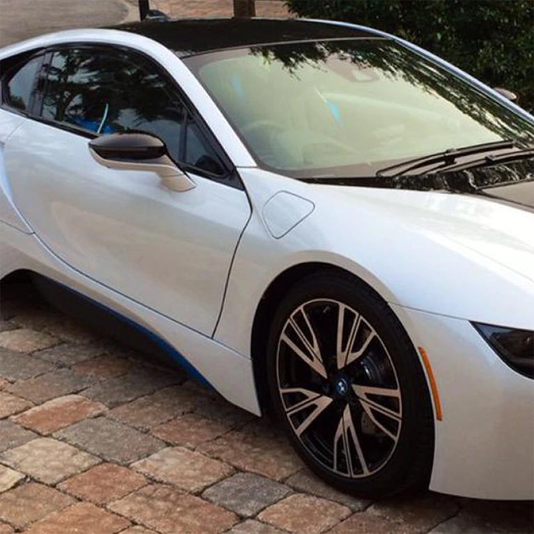A white sports car had window tinting installed by Advanced Window Tinting.