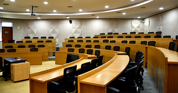 A government room with furniture that could be covered by 3M decorative film, by Aditya Sethia, Unsplash.